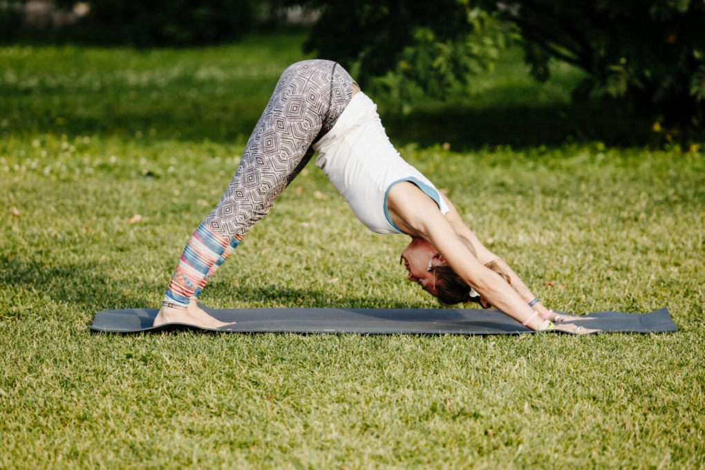 Пилатес поза собаки